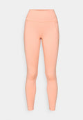 Pfirsichfarbene Leggings aus elastischem Material, mit einem hohen Bund, glatter Textur und nahtlosem Design ohne sichtbare Taschen.