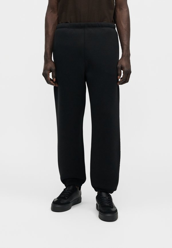 Calvin Klein COOLING SPACER  - Tracksuit bottoms - black