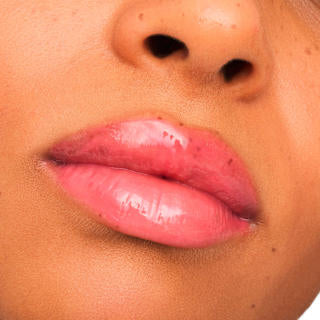 Lipgloss The Super Peptide Glossy Treatment 04 Coralized essence
