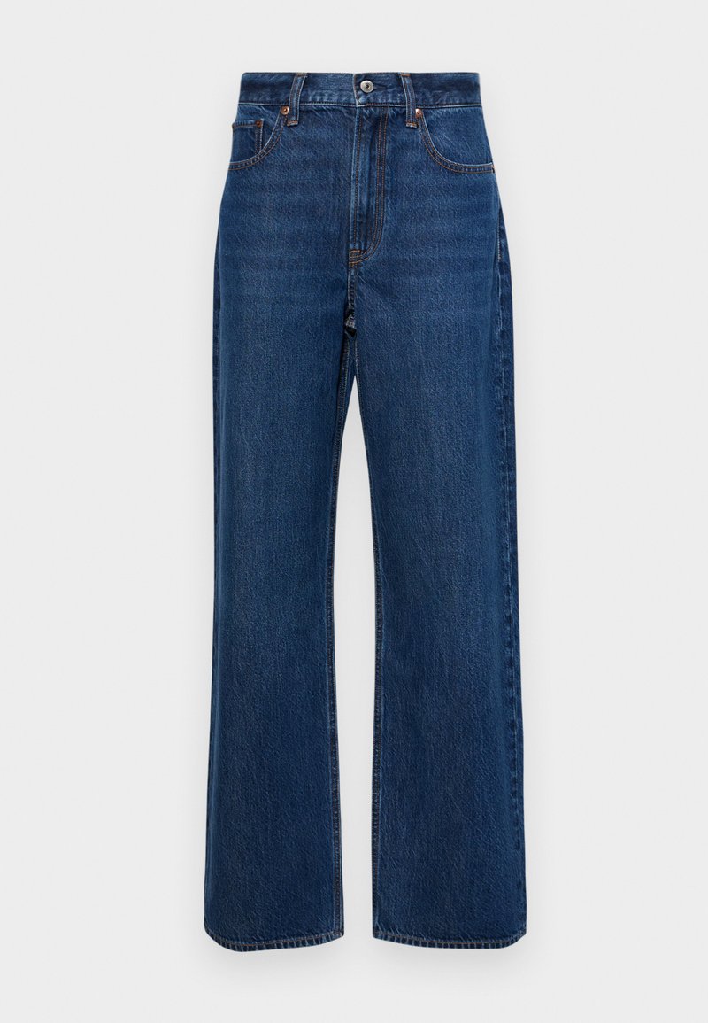 Dunkelblaue weite Jeans aus Denim mit hoher Taille, fünf Taschen und sichtbaren Nähten entlang der Nähte.
