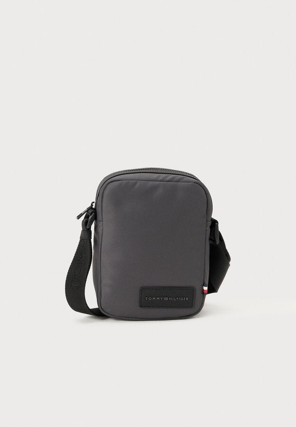 Tommy Hilfiger TEXTILE LOGO PATCH CROSSBODY REPORTER BAG - Cross body bag - dark grey