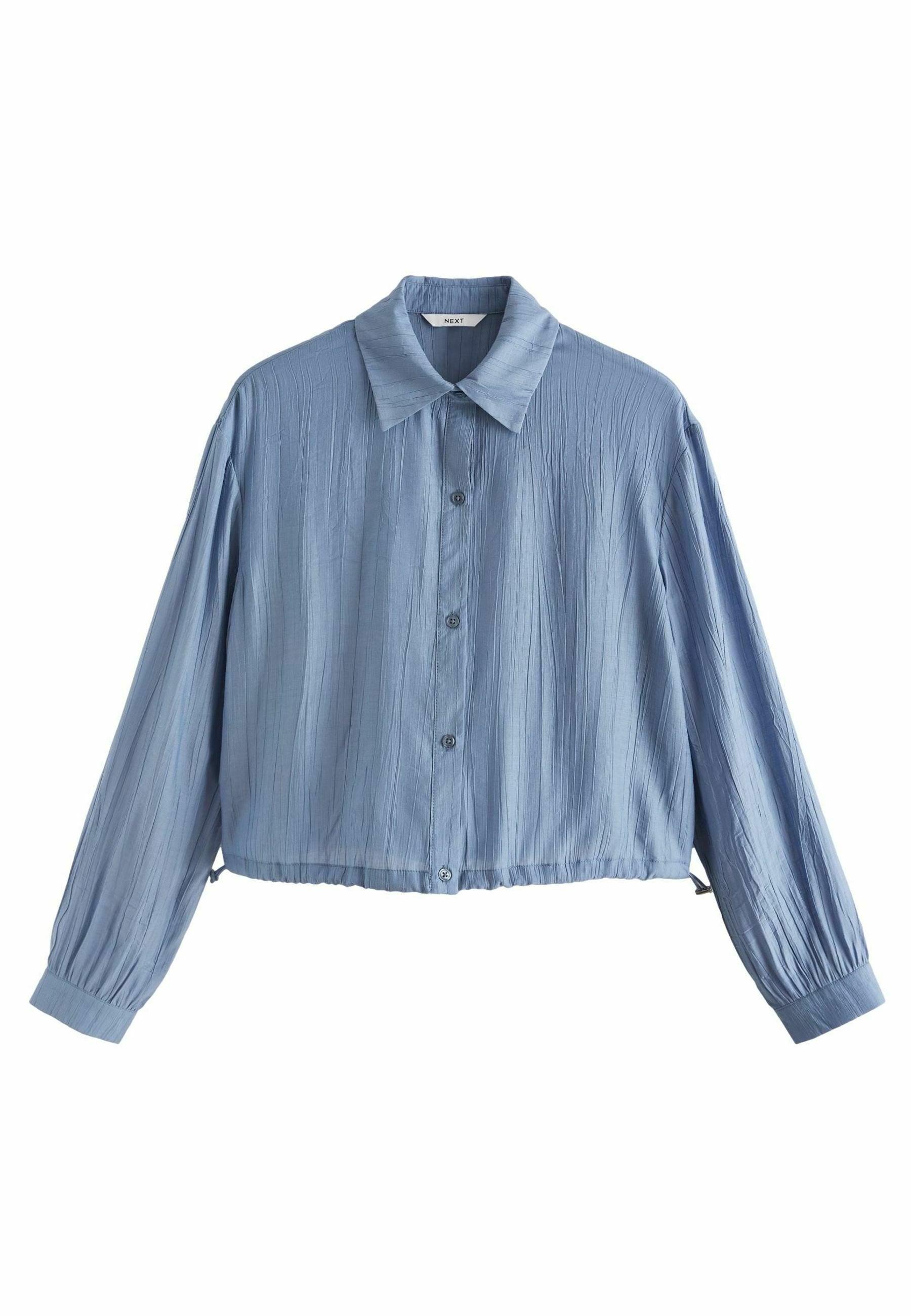 Himmelblaues, tailliertes Button-Up-Hemd aus strukturiertem Stoff, mit spitzen Kragen und langen Ärmeln mit engen Manschetten. Verfügt über eine Knopfleiste vorne.