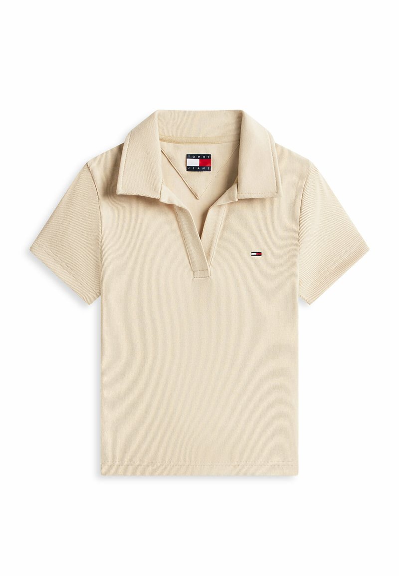 Beiges Polohemd mit kurzen Ärmeln, mit offenem Kragen und kleinem Tommy Jeans-Logo auf der Brust, aus geripptem, strukturiertem Stoff.