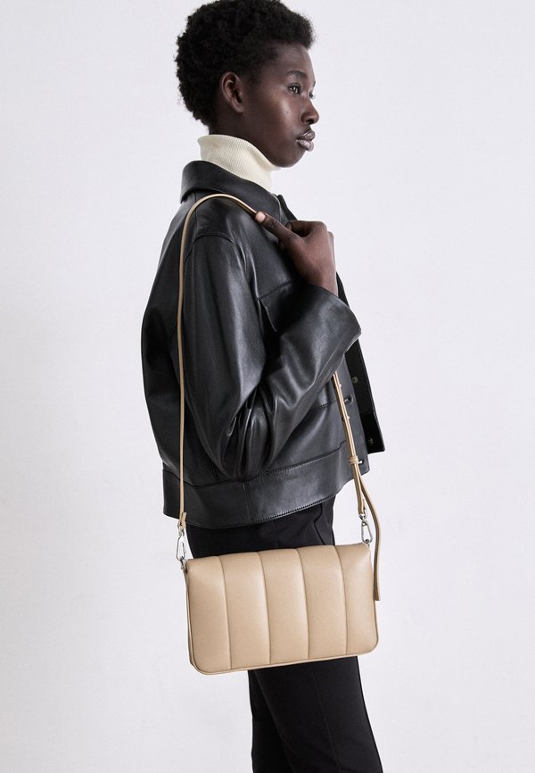 Calvin Klein LINE QUILT SHOULDER BAG - Handbag - amphora