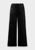 Schwarze weit geschnittene Hosen aus weichem Stoff, mit einem elastischen Bund und einer glatten Textur. Einfaches Design ohne Muster oder Akzente.