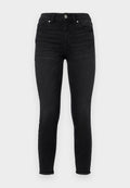 Schwarze Skinny-Jeans aus Denim, mit hoher Taille, vorderen Taschen und einem fransigen Saum. Glatte Textur mit klassischem Fünf-Taschen-Design.