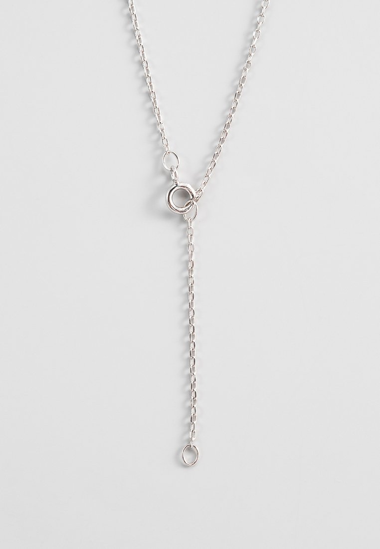 Revoni 0,1 CT. DIAMOND