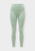 Hellgrüne nahtlose Leggings mit hoher Taille und glatter Oberfläche, präsentiert vor einem einfarbigen weißen Hintergrund.