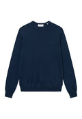 Marineblaues Sweatshirt mit langen Ärmeln aus weichem Stoff, Rundhalsausschnitt, gerippten Bündchen und kleinem Logo auf der Brust.