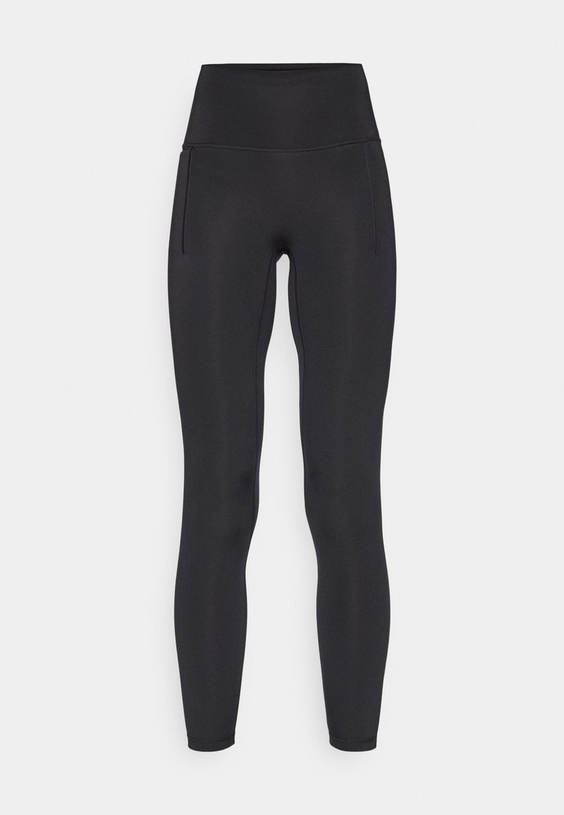 Schwarze Leggings mit hoher Taille aus dehnbarem Stoff. Sie zeichnen sich durch eine glatte Textur, schmale Passform und seitliche Taschen für zusätzlichen Komfort aus.