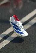 adidas Performance ADIZERO TAKUMI SEN 11 - Road running shoes - footwear white/team royal blue/pure ruby