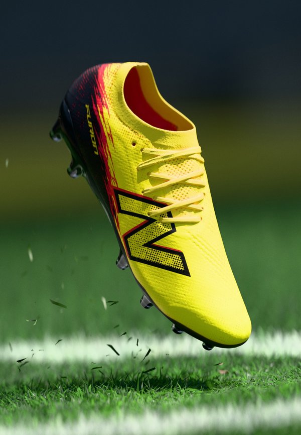 New Balance FURON V8 PRO MG - Football boots artificial grass - punch yellow/black 100/fire cracker