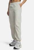 Under Armour UNSTOPPABLE WOVEN - Tracksuit bottoms - summit white