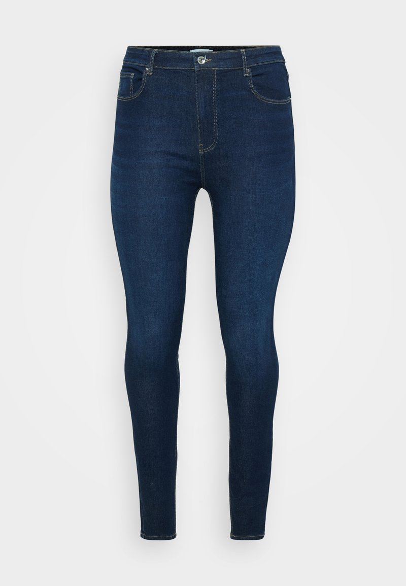 Dunkelblaue Jeans aus Denim mit einer taillierten Passform, mittelhohem Bund, fünf Taschen und kontrastierenden Nähten entlang der Nähte und Taschen.