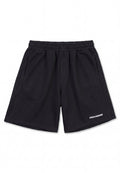 Schwarze Sportshorts mit elastischem Bund, seitlichen Taschen und dem "PEGADOR"-Logo am unteren linken Bein vor weißem Hintergrund.