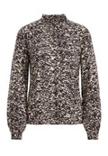 Langärmliger Pullover mit Mock-Neck, schwarz-weißem abstrakten Strickmuster und gerippten Bündchen.