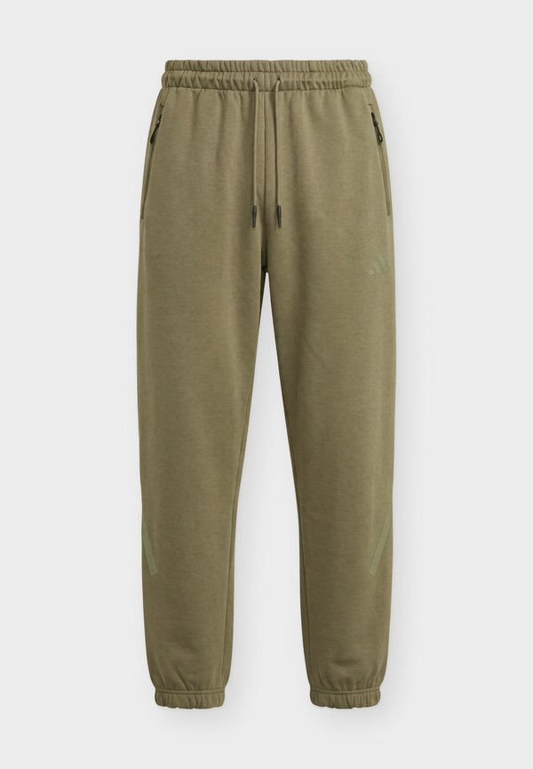 adidas Sportswear Z.N.E. PANTS - Tracksuit bottoms - olive strata