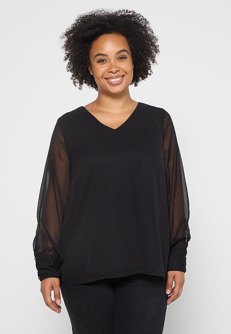 Schwarze Bluse mit V-Ausschnitt, langen transparenten Ärmeln und lockerer Passform. Der Stoff hat eine glatte Textur mit geschichteten Ärmeln für zusätzlichen Stil.