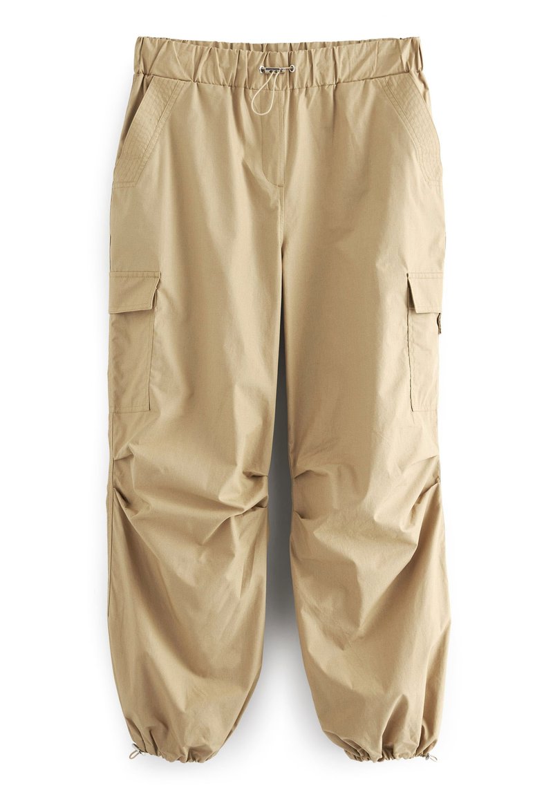 Beige Cargo-Hosen mit elastischem Bund, Kordelzug und elastischen Bündchen. Mit Seitentaschen und aus weichem, leichtem Stoff.