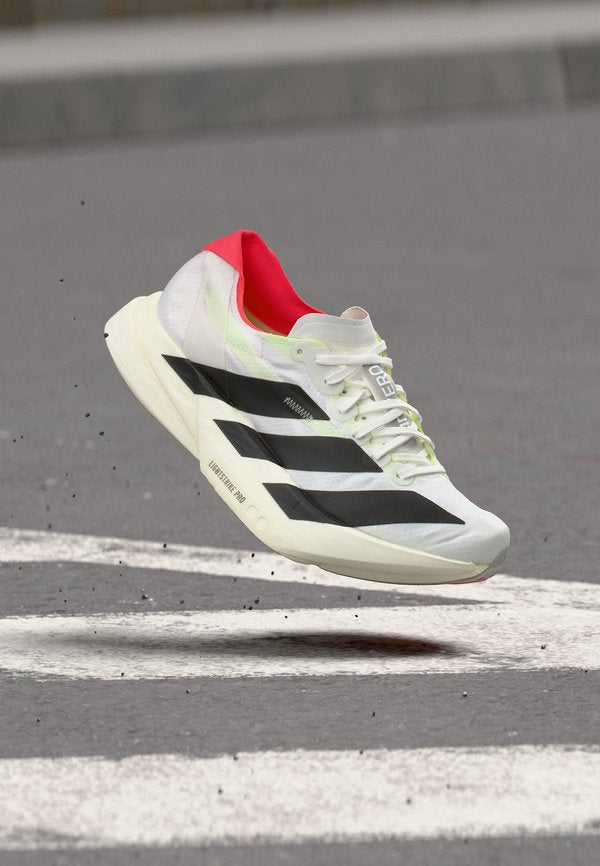 adidas Performance ADIZERO ADIOS PRO 4 - Road running shoes - cloud white/core black/silver-coloured metallic