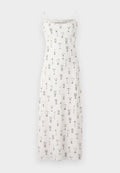 Ärmelloses Maxikleid aus weißem Stoff mit schwarzen Cocktails als Illustrationen. Verfügt über dünne Träger und einen lässigen Schnitt.