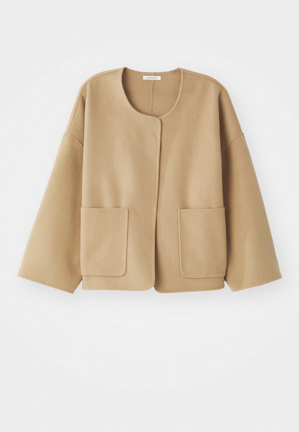 By Malene Birger JACQUIE