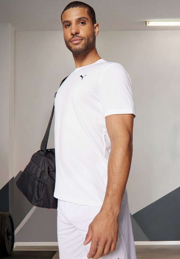 Puma TAD ESSENTIALS SOLID CAT TEE - Sports T-shirt - white