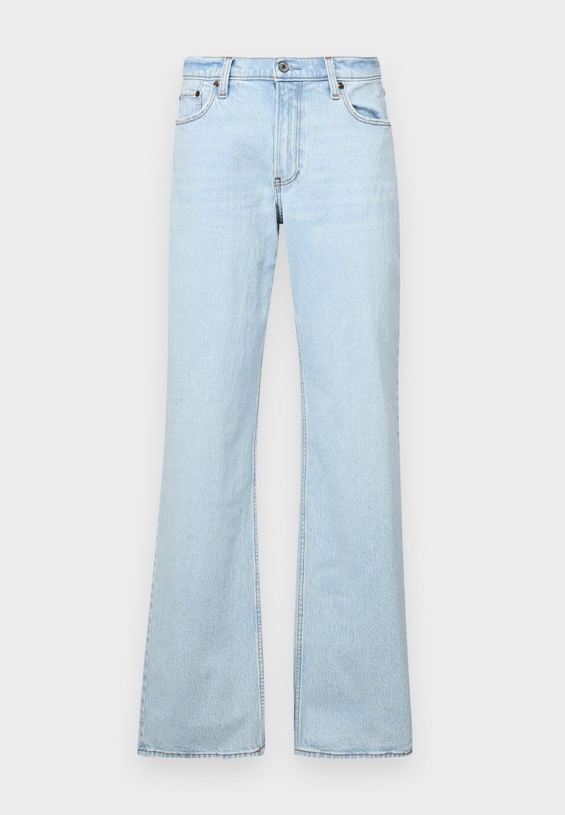 Hellblaue Schlagjeans aus Denim, mit fünf Taschen, einem vorderen Knopfverschluss und Ziernähten. Glatte Textur, lässiges Design.