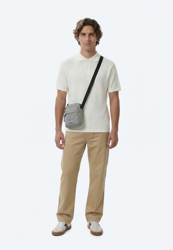 Calvin Klein BOLD REPORTER - Cross body bag - cloud burst