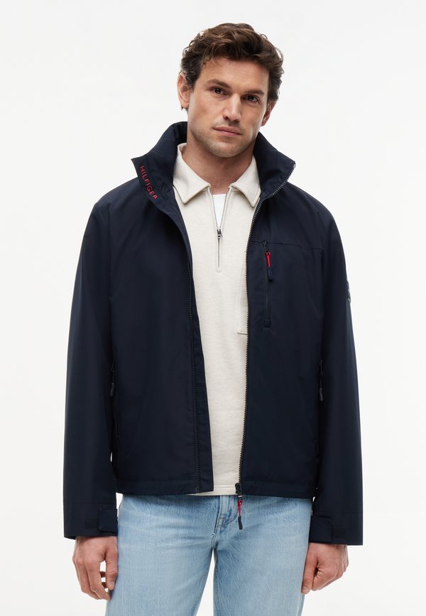 Tommy Hilfiger CREW ATHLEISURE SAIL PACK - Light jacket - desert sky