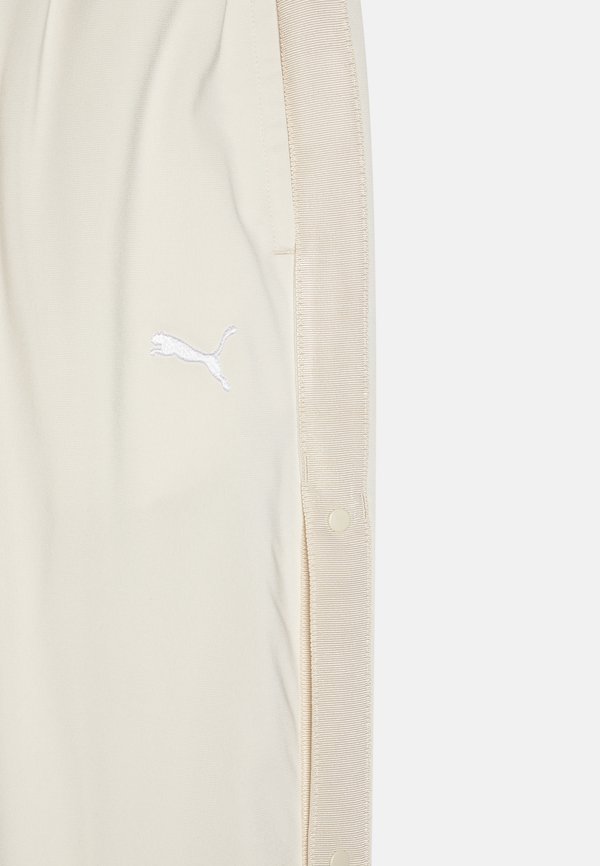 Puma WARDROBE RELAXED POPPER PANTS UNISEX