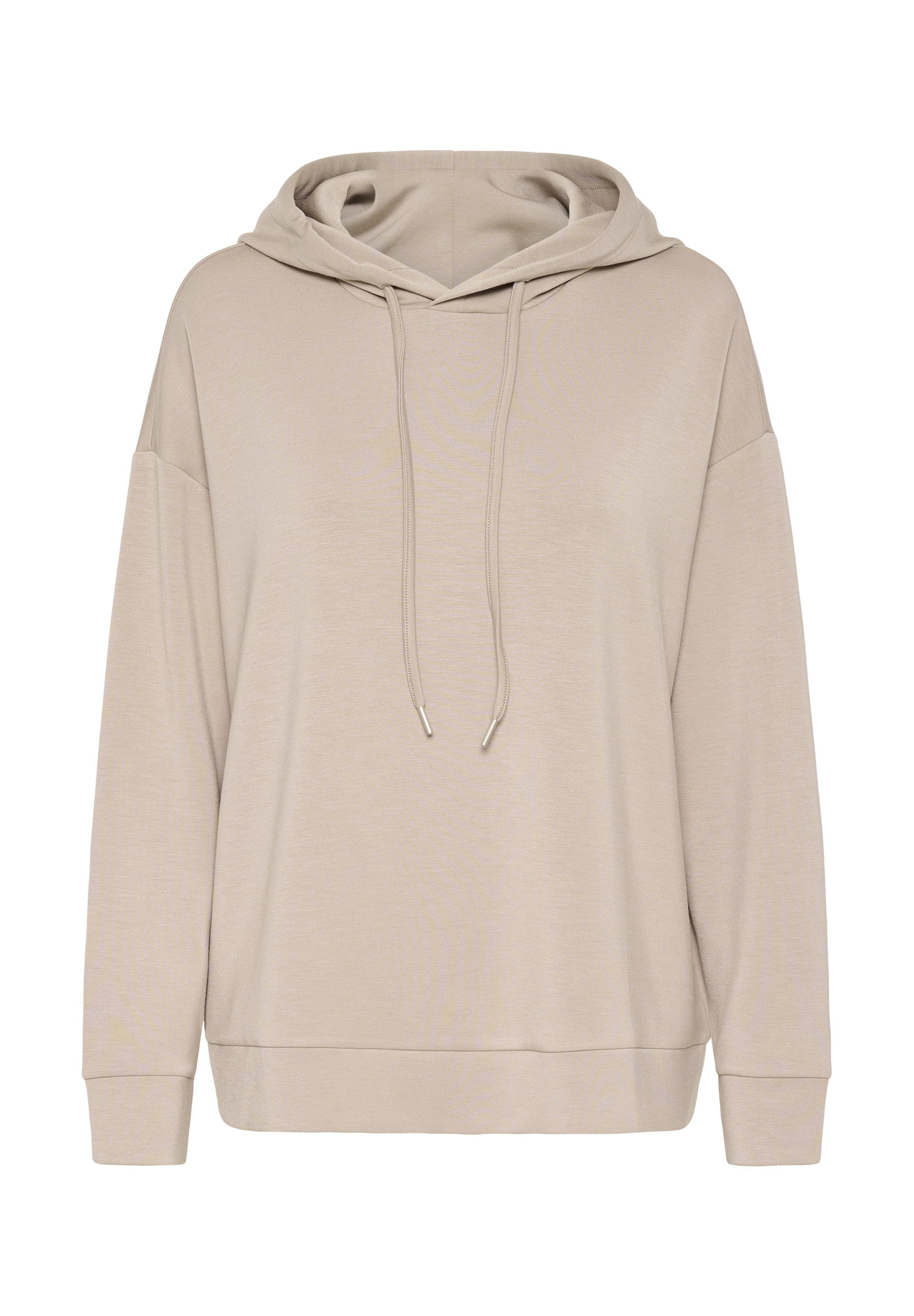 Beige Kapuzenpullover mit lockerer Passform, Kordelzugdetail und gerippten Bündchen. Weichstoff mit minimalen Nähten für ein glattes Erscheinungsbild.