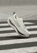 Nike Performance VOMERO PLUS - Road running shoes - summit white/mtlc silver-sail-anthracite-black