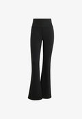 adidas Sportswear SEASONAL ESSENTIALS FLARED - Tracksuit bottoms - black