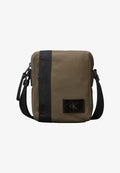 Calvin Klein UNISEX - Cross body bag - deep olive