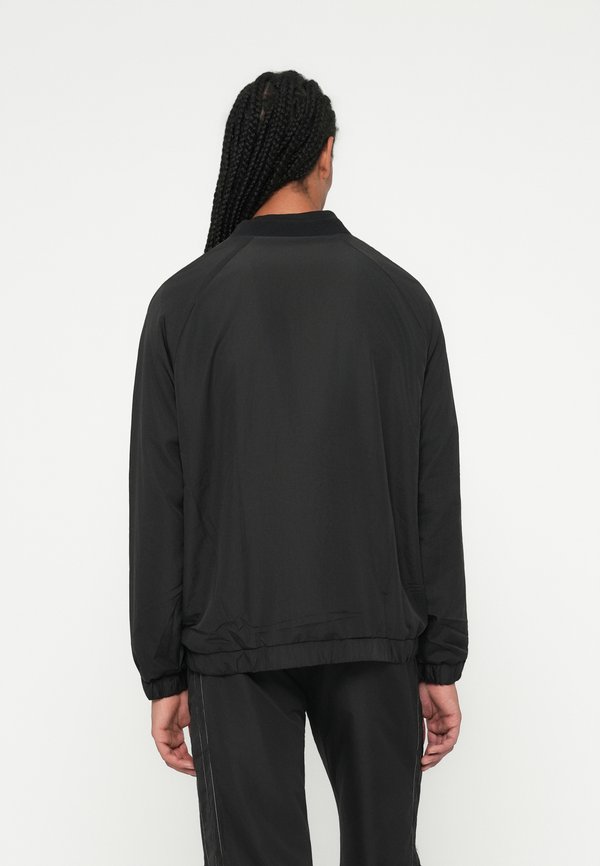 Umbro REVERSIBLE CREW TOP
