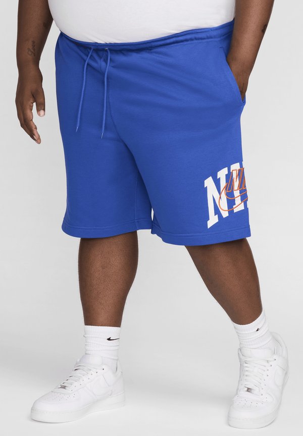 Nike Sportswear Tracksuit bottoms - game royal safety orange