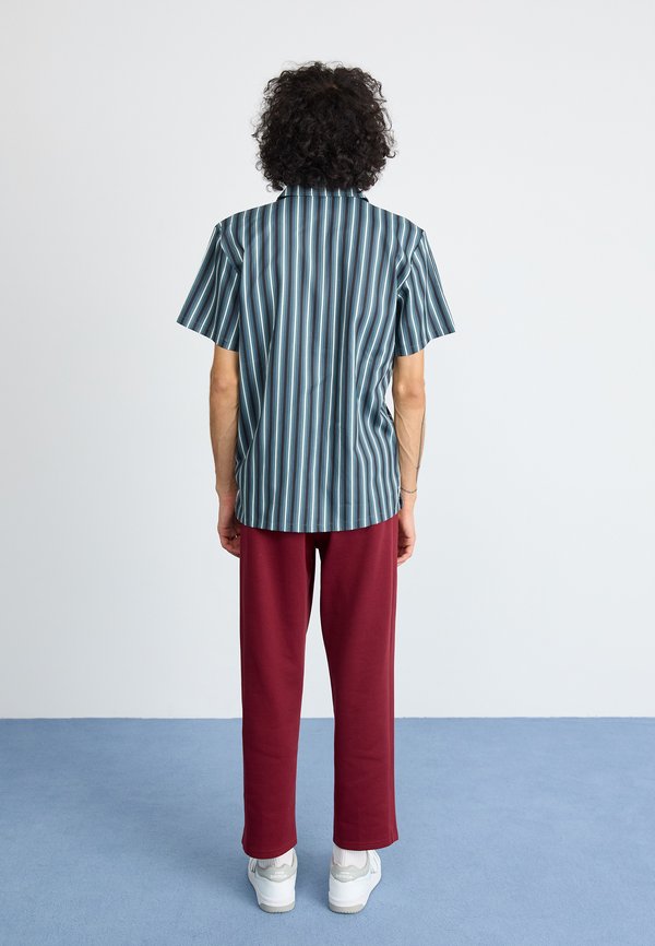 New Balance POST SEASON TRACK PANT