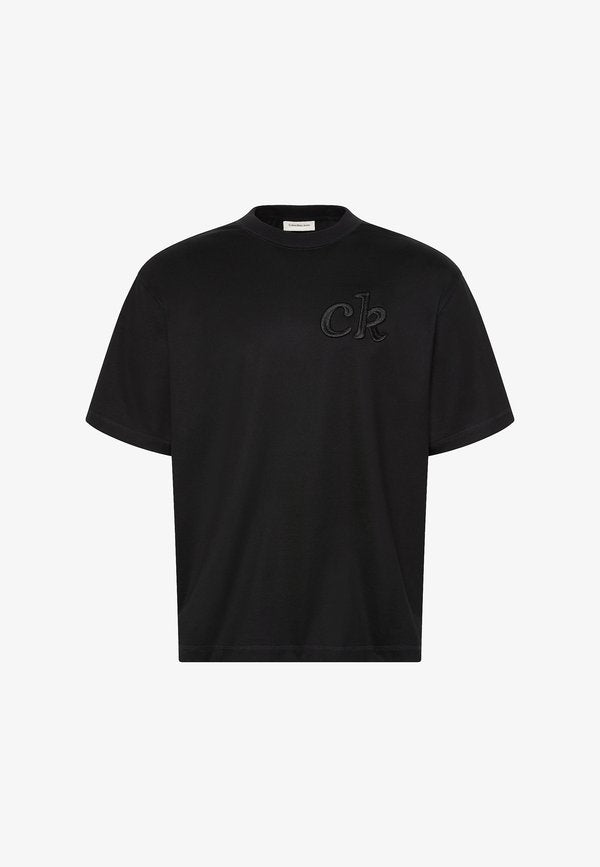 Calvin Klein Jeans CALVIN KLEIN JEANS RELAXED LOGO APPLIQUÉ T-SHIRT - Print T-shirt - black