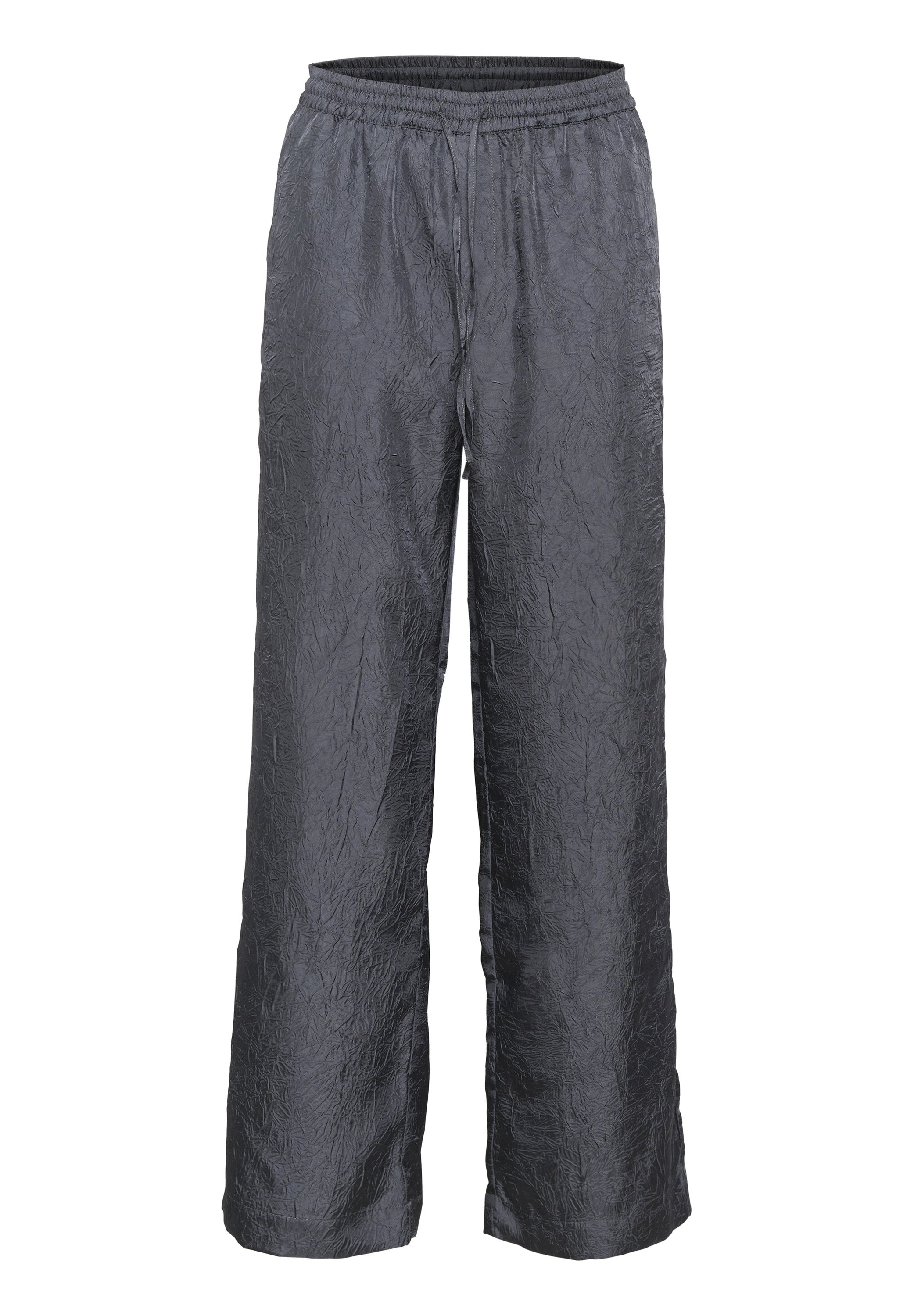 Graue, weite Hosen aus gekräuseltem Stoff. Mit einem elastischen Bund und Kordelzug sowie einer strukturierten Oberfläche für zusätzliche Details.