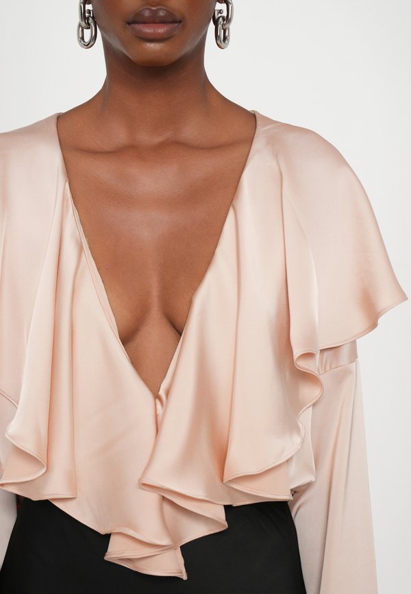 Norma Kamali LONG SLEEVE DEEP V RUFFLE BODYSUIT