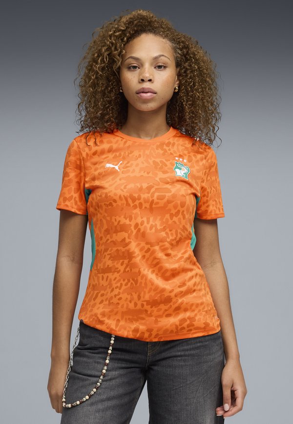 Puma ELFENBEINKÜSTE 2026 HEIMTRIKOT - Football jersey - rickie orange-sport green