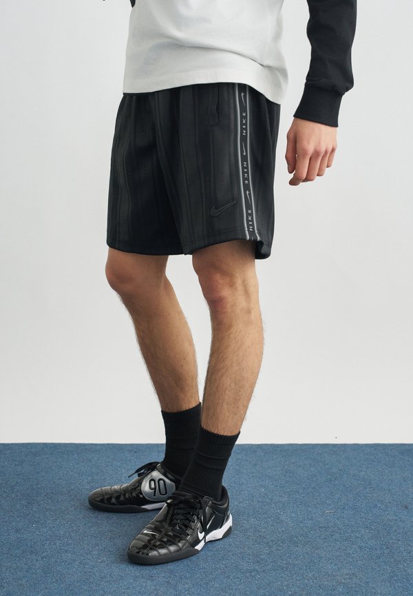Nike Sportswear Tracksuit bottoms - black