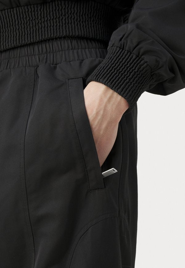 Han Kjøbenhavn OVERSIZED TRACK TROUSERS UNISEX