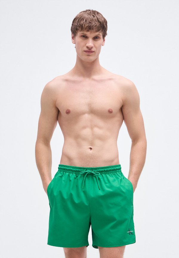 Calvin Klein Swimwear MEDIUM DRAWSTRING WAISTBAND - GRAPHIC MONOGRAM  - Swimming shorts - mardi gras green