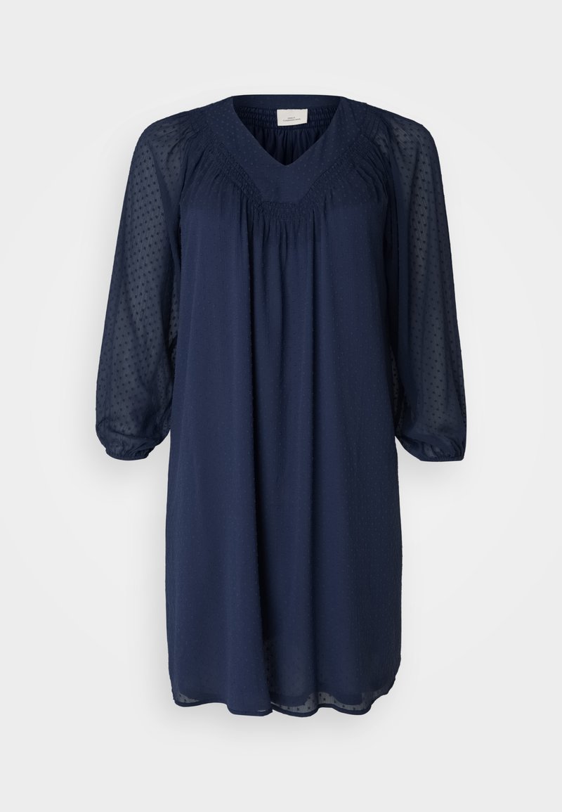 Navyblaues Kleid mit V-Ausschnitt, langen transparenten Ärmeln und Raffung am Oberteil. Texturiertes Material mit einem Punkte-Muster.