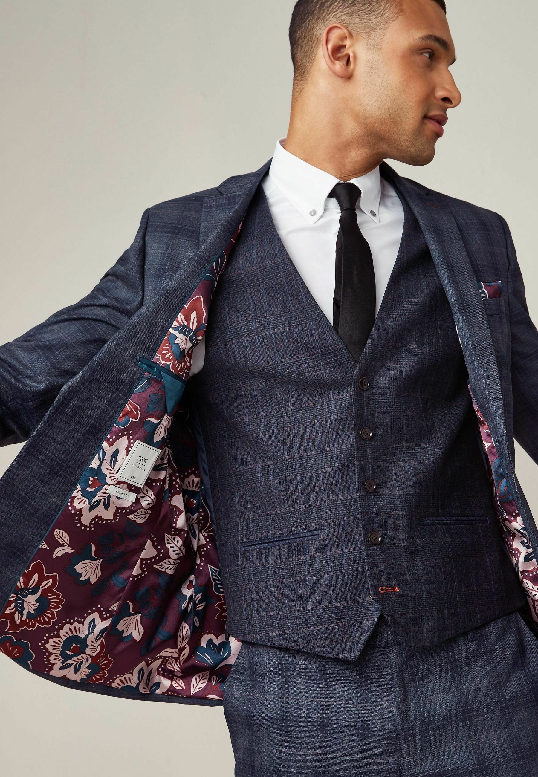 Next CHECK SUIT