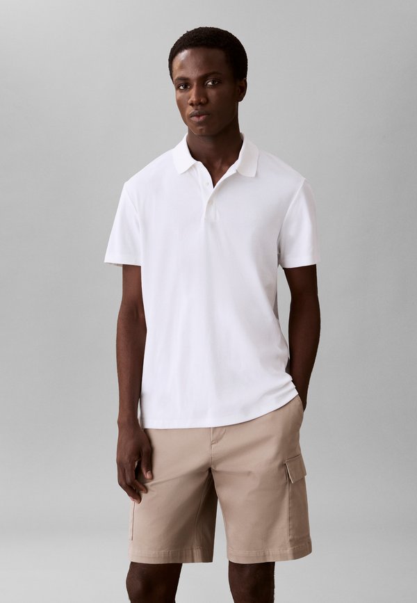 Calvin Klein TECH INTERLOCK COLLECTION - Polo shirt - bright white