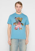 Türkisfarbenes Baumwoll-T-Shirt mit einem Bärenmotiv, das aus buntem Text und Mustern besteht. Kurzärmlig, Rundhalsausschnitt.