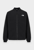 Schwarze Bomberjacke aus leichtem Stoff. Verfügt über einen Reißverschluss vorne, elastische Bündchen und ein Logo auf der linken Brust. Glatte Textur.